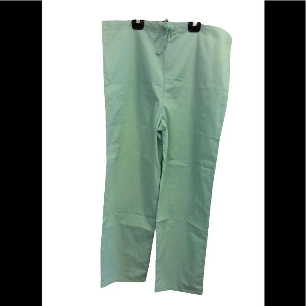 New unisex Mint colored scrub pants with drawstring waist, back and side pocket.